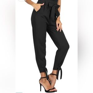 Grace Karin Black pants with tie belt and tie details on the bottom.